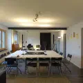 Grande salle en en réunion ou repas pour 14 personnes